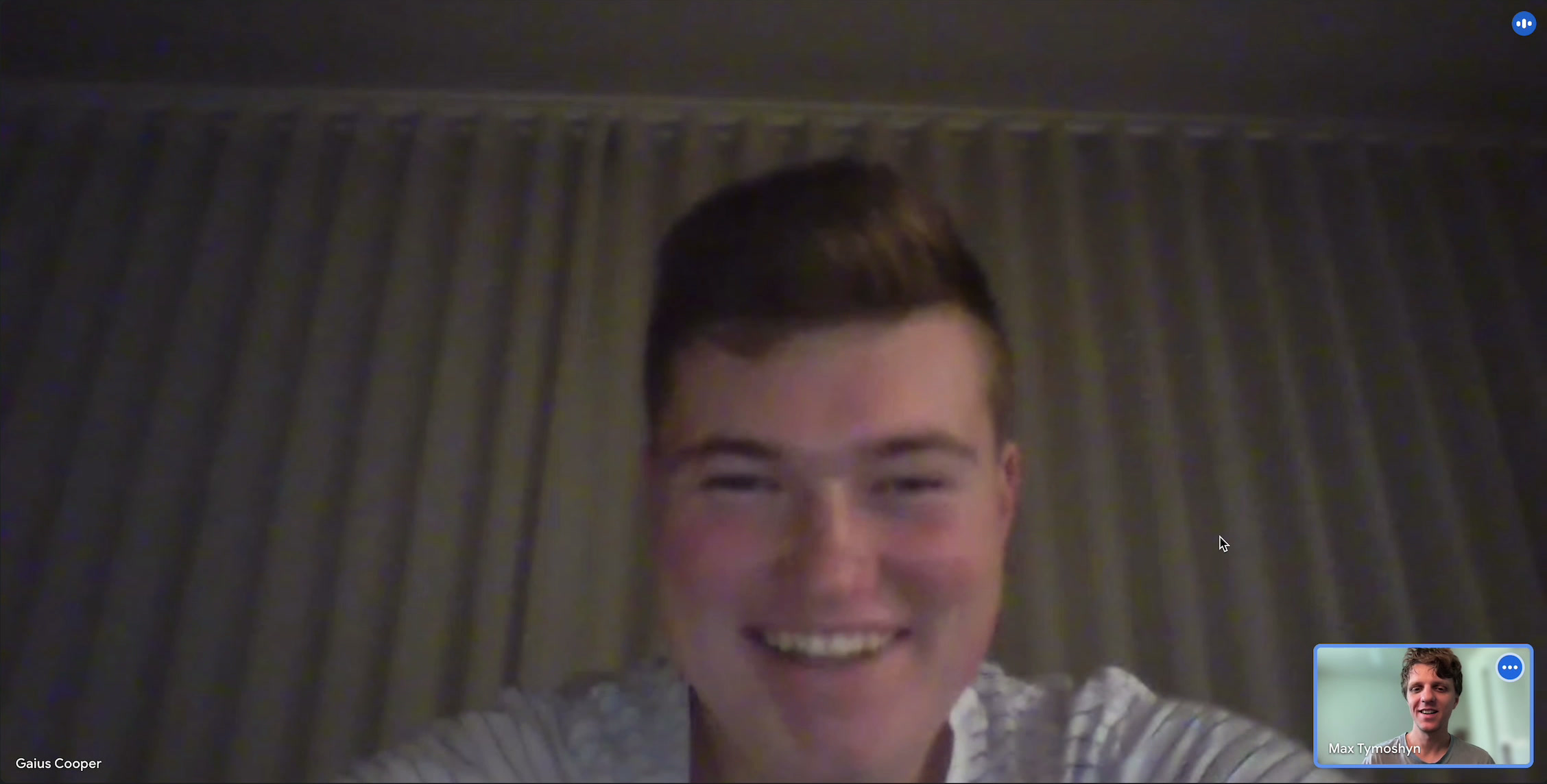 Gaius Cooper and Max Tymoshyn smiling on a video call